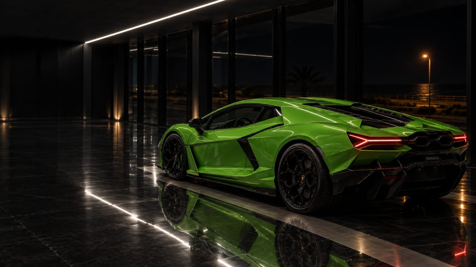 A 2025 Lamborghini Revuelto in Verde Mantis on the black floor, under the line