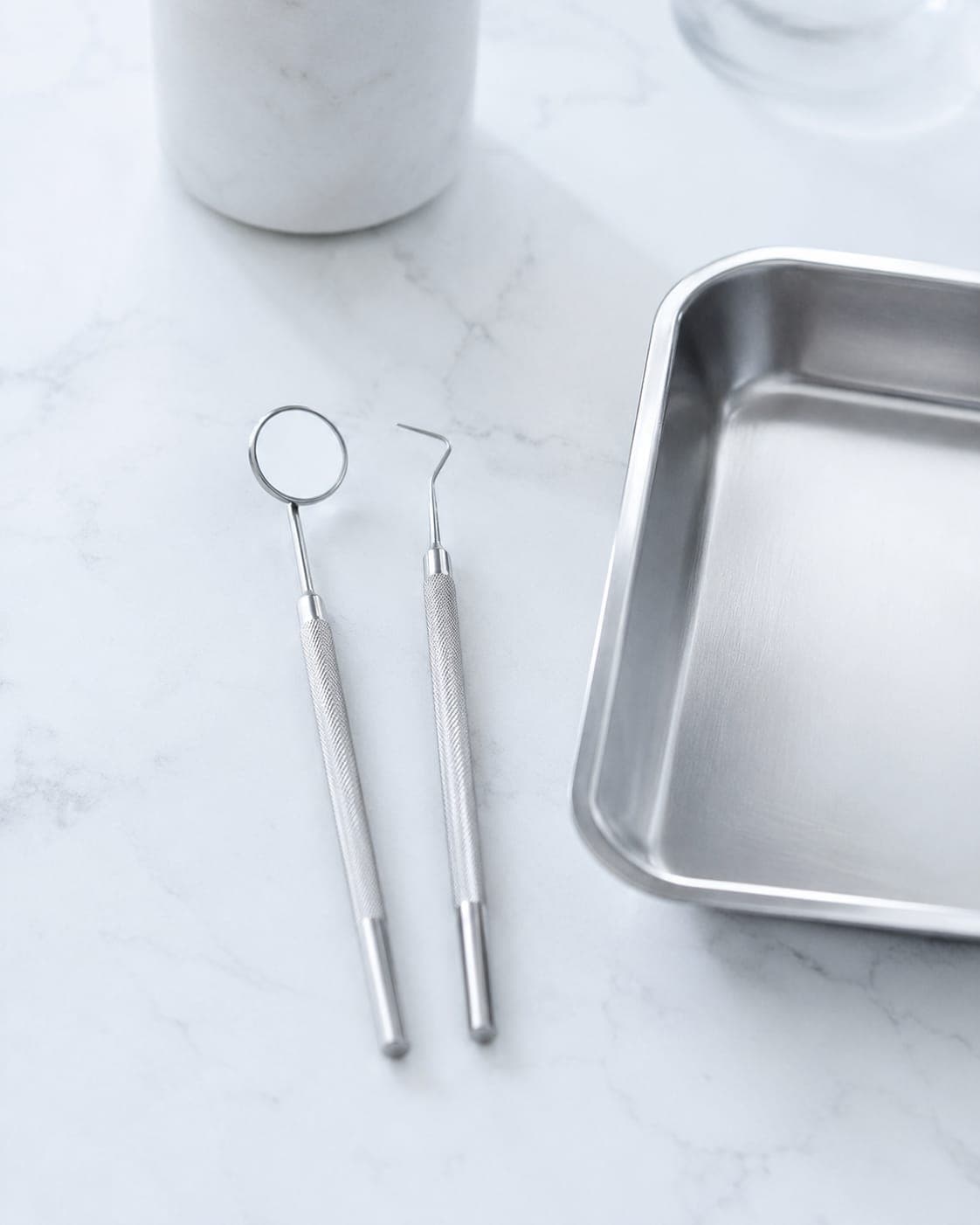 Hygiene and gum care — sterilised scaling instruments laid out on a tray