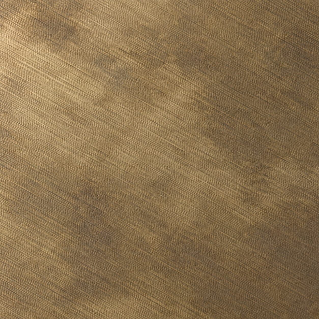 Close-up of a brushed brass profile